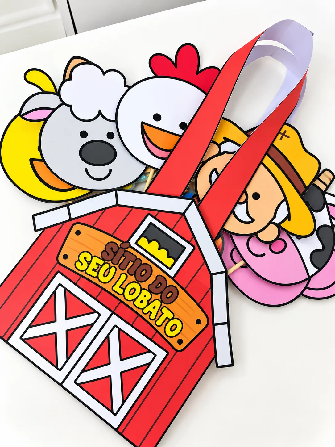 Imagem da galeria 1 de Sacola Musical Sítio do Seu Lobato com Palitoches de Animais