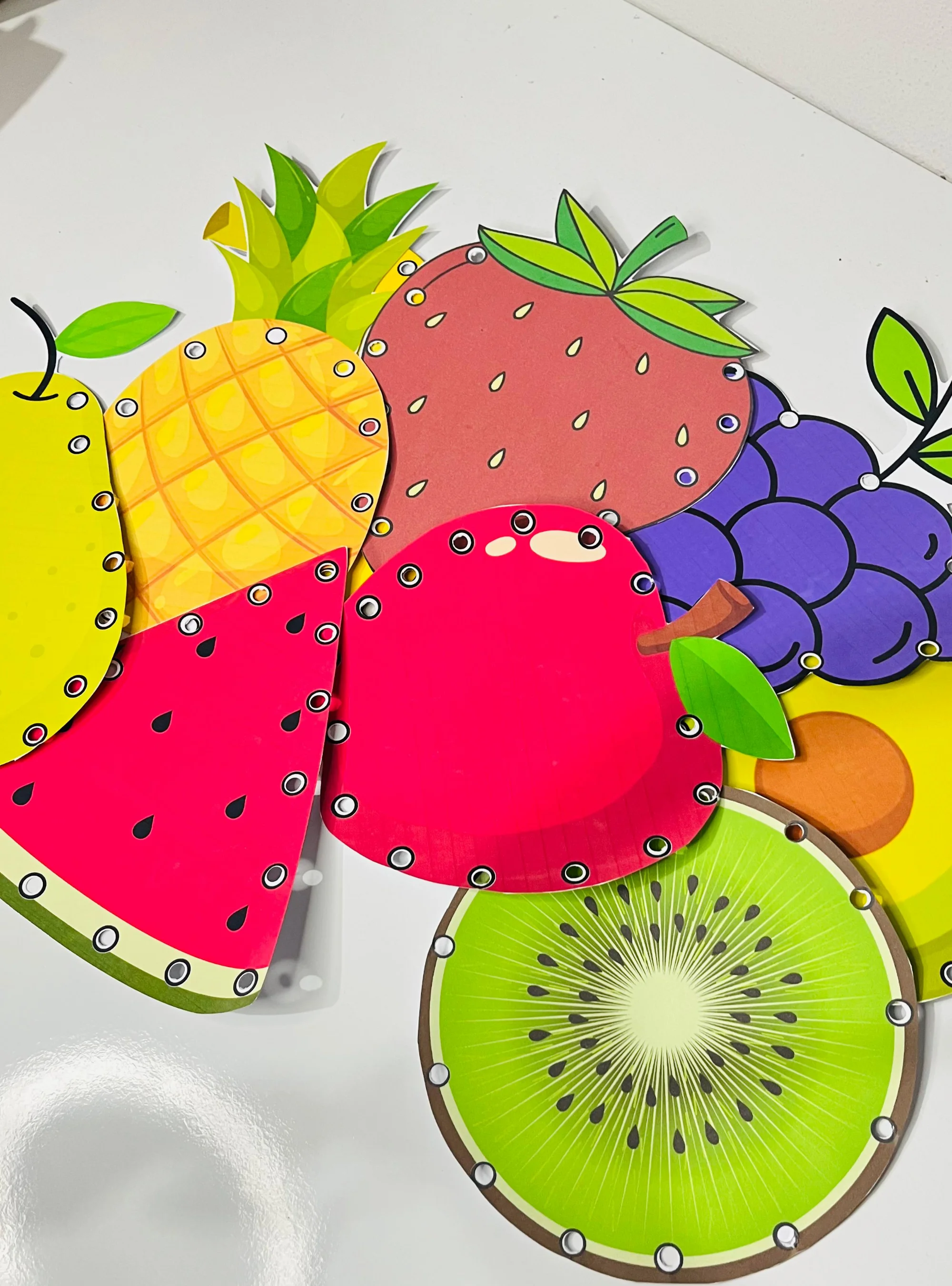 Capa de Alinhavos das frutas – Material Pedagógico